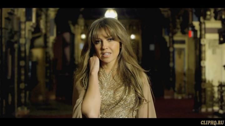 скачать клип Thalia - Vuelveme a Querer