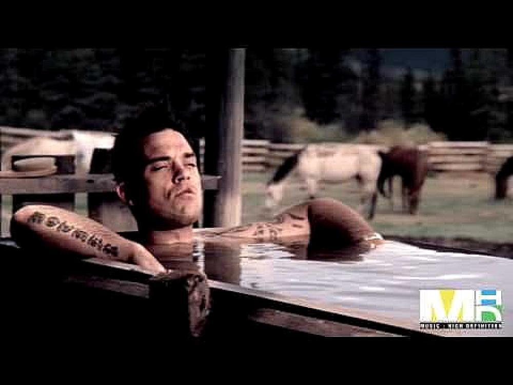 скачать клип Robbie Williams - Feel